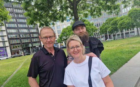 Group enjoying The Lost Gold of Berlin city exploration game in a park setting.