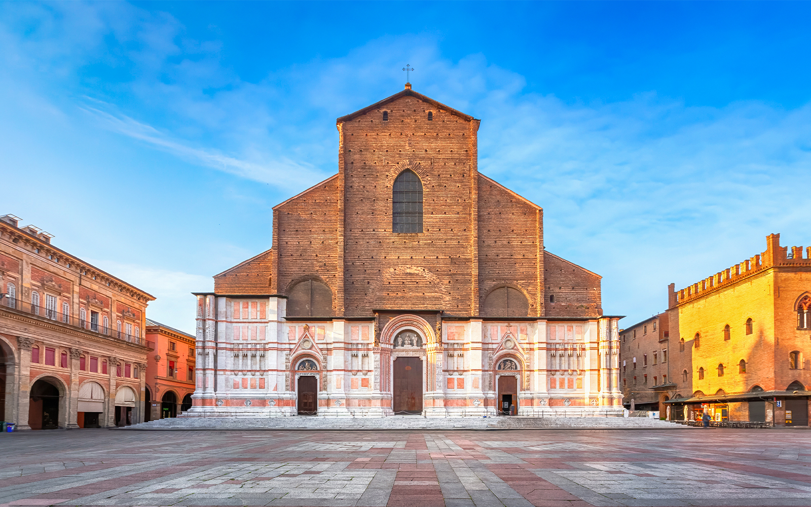 Basilica of San Petronio in Bologna, Italy, with surrounding historic buildings.