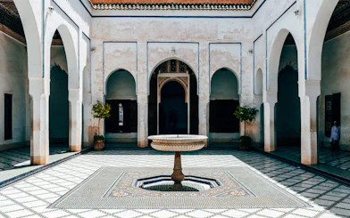 Bahia Palace courtyard with central fountain in Marrakech.