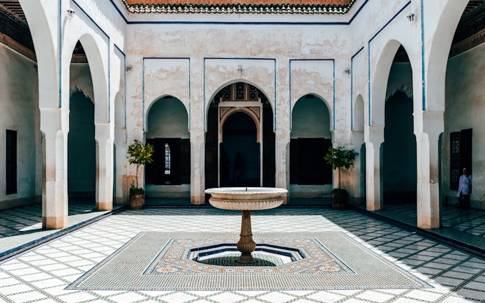 Bahia Palace courtyard with central fountain in Marrakech.