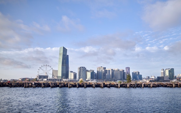 Melbourne skyline with Ferris wheel viewed from the river during a 2-hour cruise.