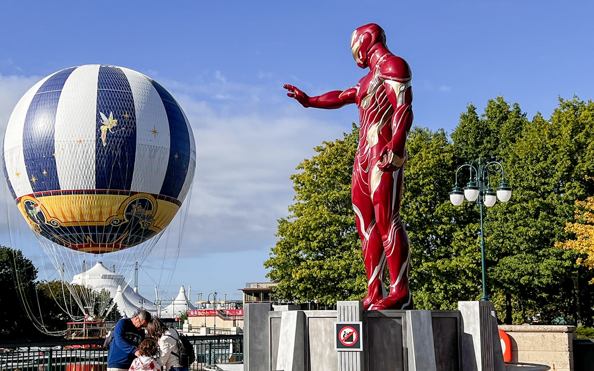 Iron Man statue and hot air balloon at Disneyland Paris.