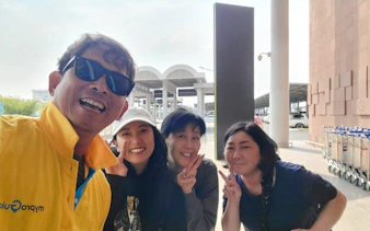 Group of travelers at Siem Reap Angkor Airport during a private transfer.