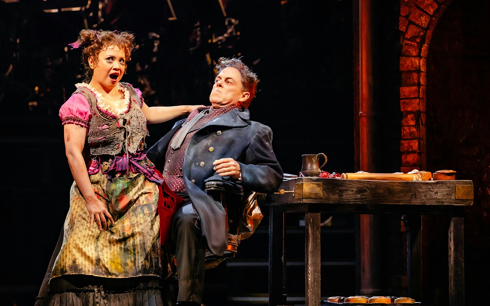 Actors performing a scene from Stephen Sondheim's Old Friends on stage.