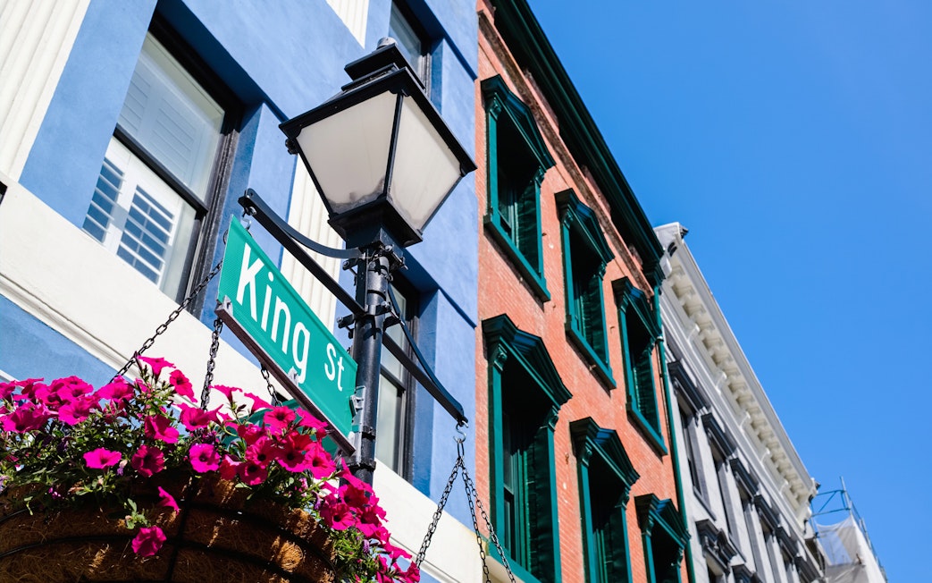 King Street sign and historic buildings in Charleston's French Quarter.