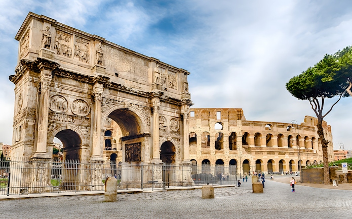 Colosseum and Arch of Constantine in Rome, Italy, part of escorted entrance combo pass tour.