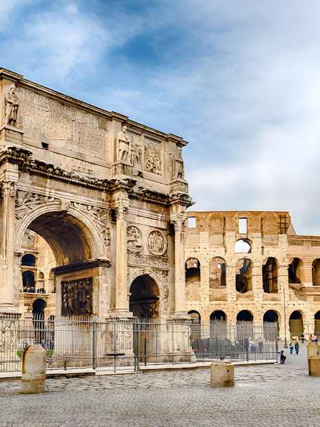 Colosseum and Arch of Constantine in Rome, Italy, part of escorted entrance combo pass tour.