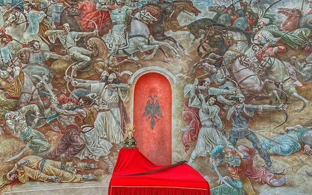 Mural depicting a historical battle scene inside the Skanderbeg Museum, Kruja Castle, Albania.