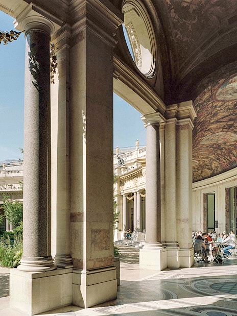 Petit Palais interior with visitors seated under ornate ceiling, Paris, Bruno Liljefors exhibition.