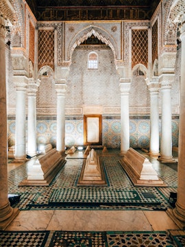 Tourists exploring historic architecture in a European city.