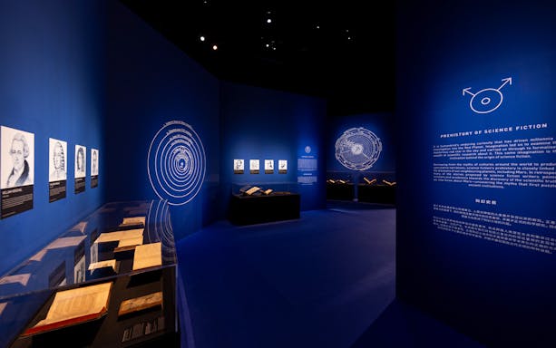 ArtScience Museum Singapore exhibit featuring historical science fiction artworks and texts.