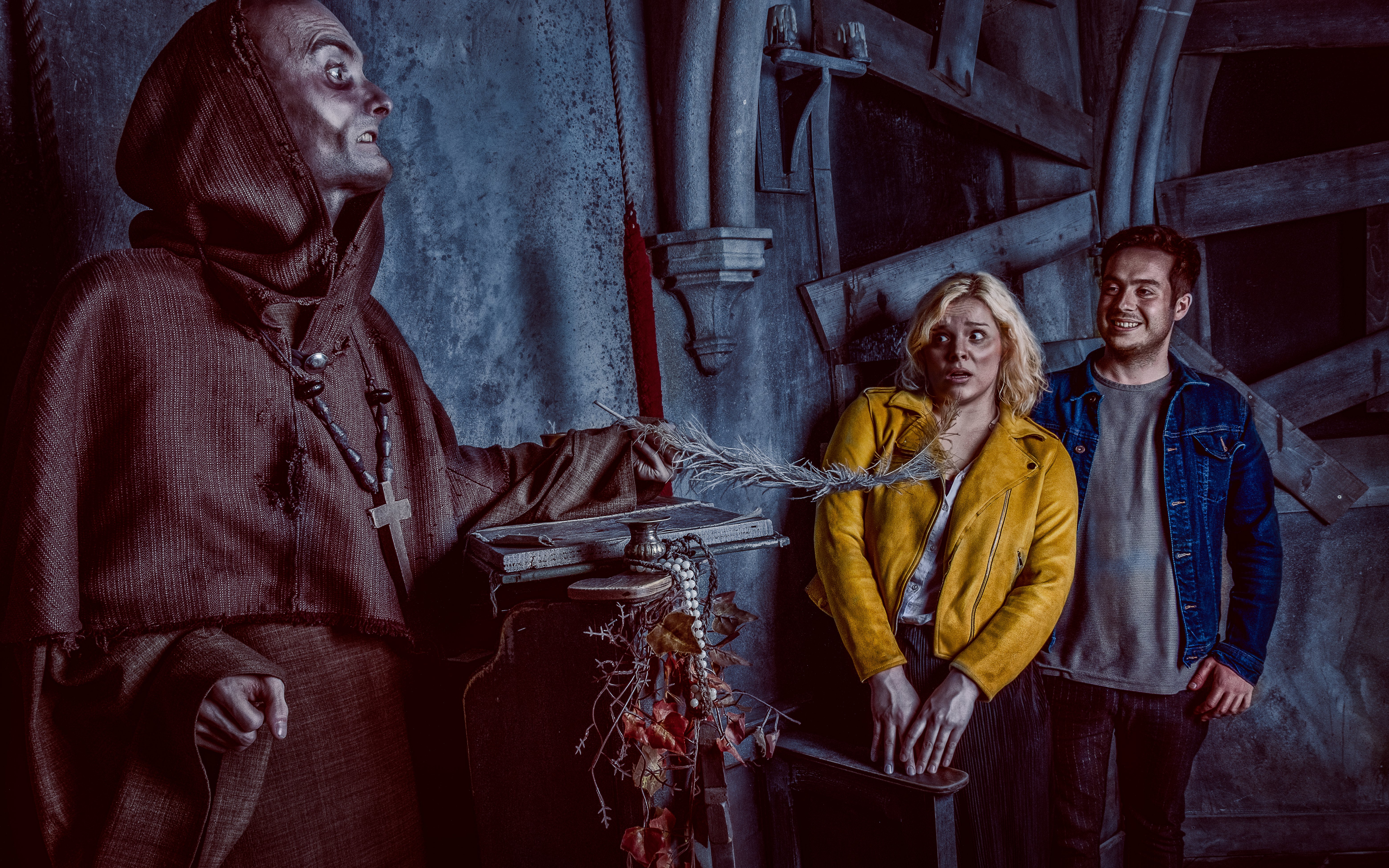 Visitors react to a costumed actor at the York Dungeon's Fear the Vikings experience.