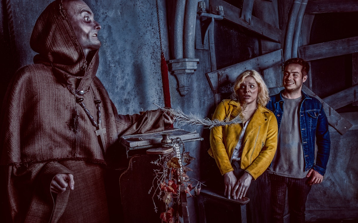 Visitors react to a costumed actor at the York Dungeon's Fear the Vikings experience.