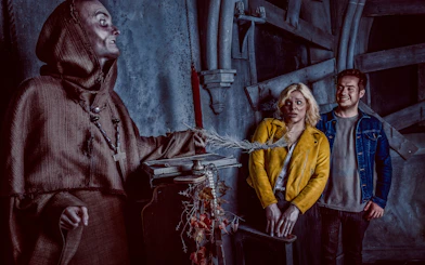 Visitors react to a costumed actor at the York Dungeon's Fear the Vikings experience.