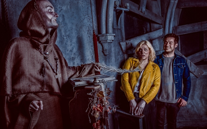 Visitors react to a costumed actor at the York Dungeon's Fear the Vikings experience.