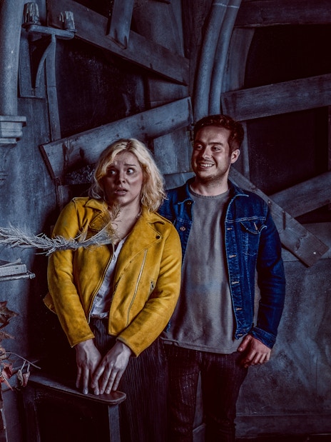 Visitors react to a costumed actor at the York Dungeon's Fear the Vikings experience.