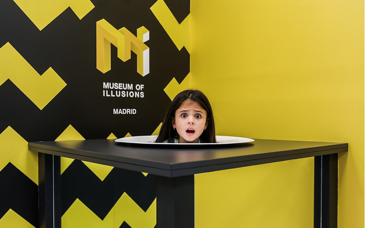 Head illusion exhibit at Museum of Illusions, Madrid.