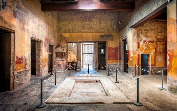 Entrance vestibule of the House of Menander, Pompeii, showcasing ancient Roman architecture.