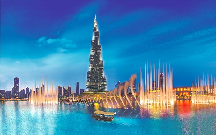 Burj Khalifa and Dubai Fountain show at night, Dubai, UAE.