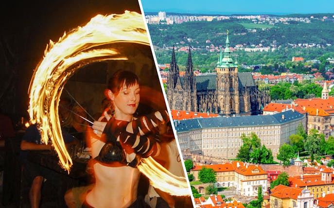 Medieval fire performer with Prague Castle in the background.