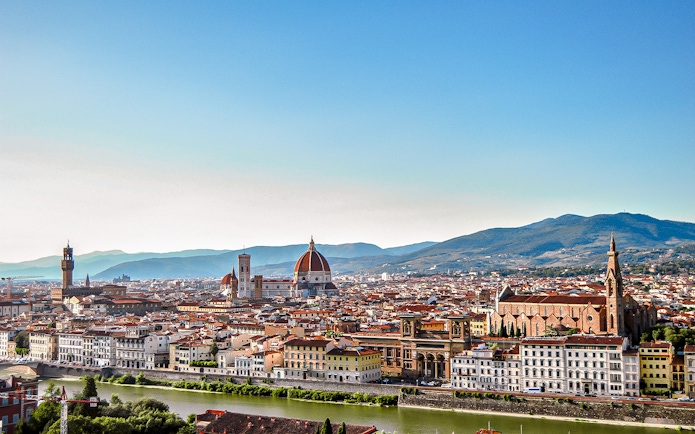 Florence skyline with Duomo and hills, part of 2-hour electric bike tour.