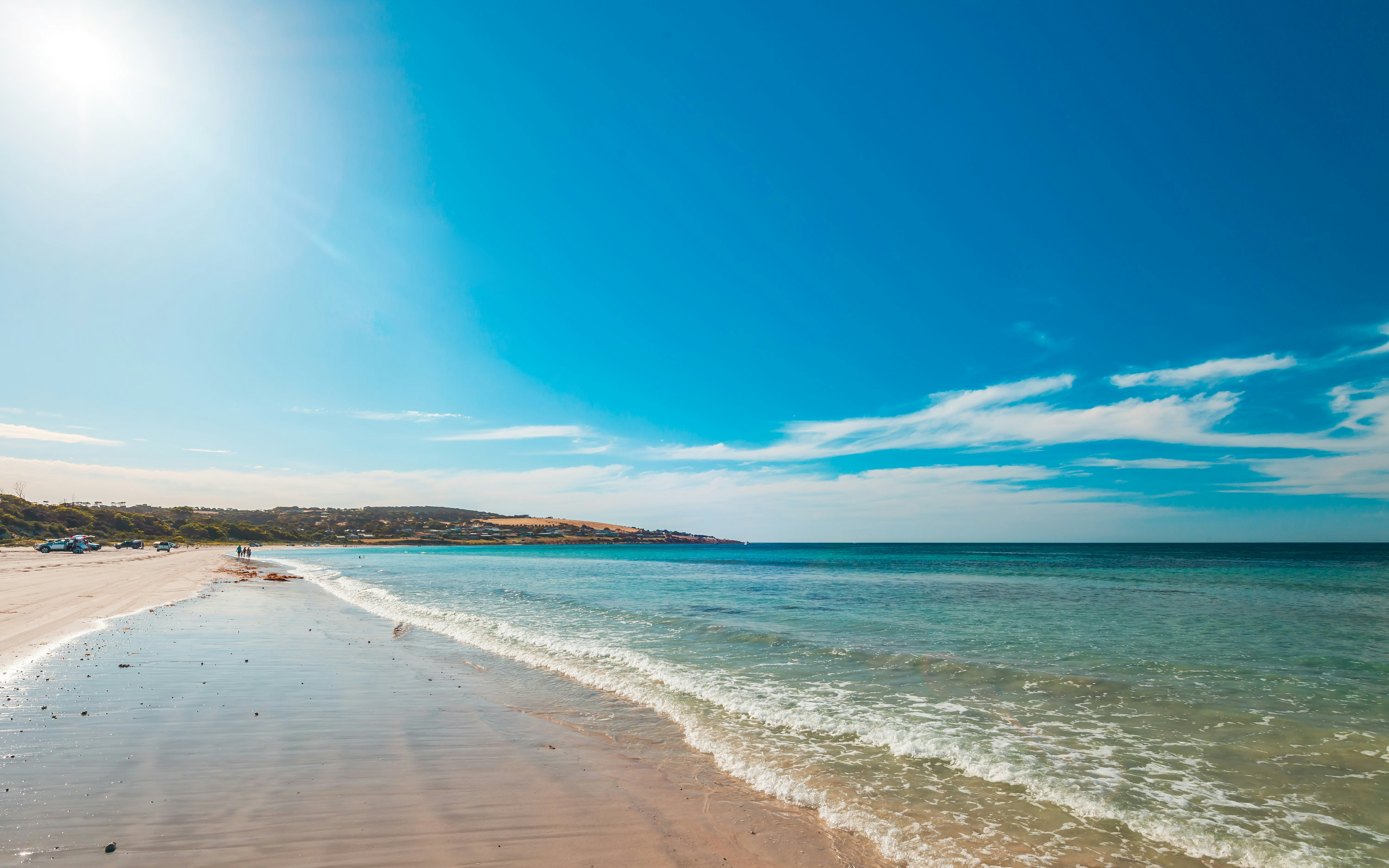 Emu Bay shoreline with clear blue water and sandy beach, Kangaroo Island, Australia.