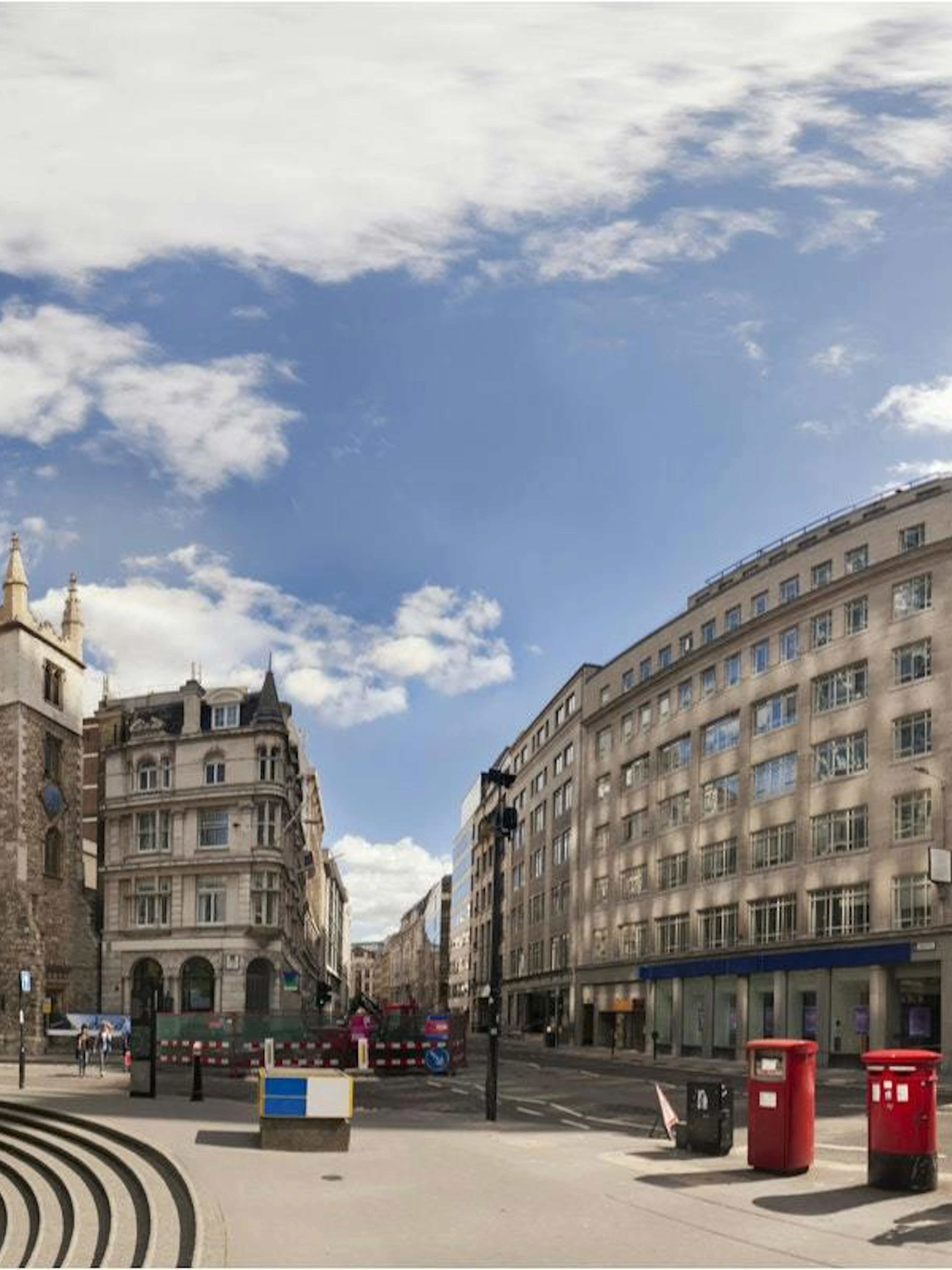 Modern and historic architecture in Liverpool city center, featuring iconic buildings.