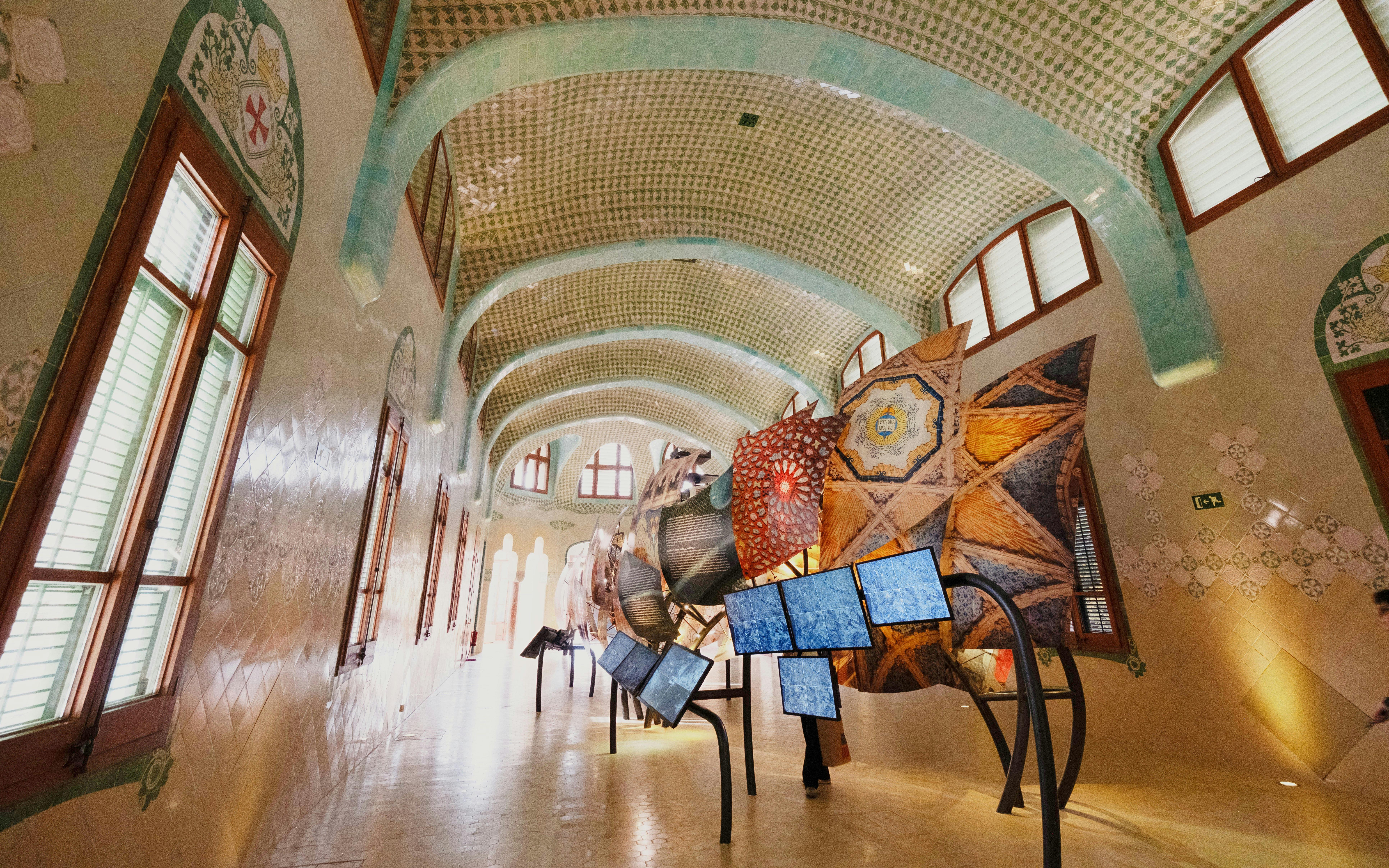 Sant Pau Modernista interior with decorative tiles and art installation, Barcelona.