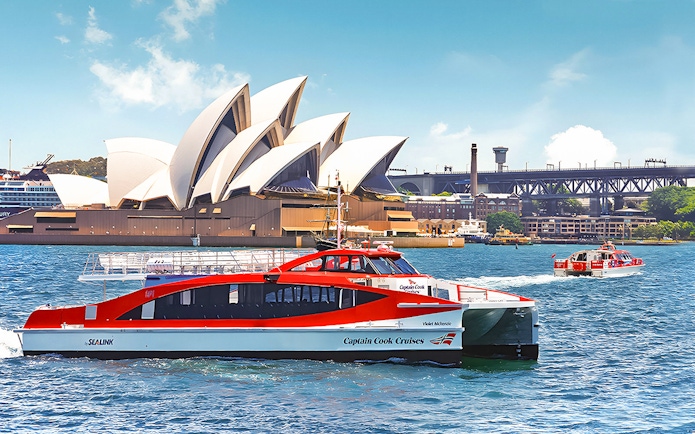 Cruise ship near Sydney Opera House on Hop-On-Hop-Off Sydney Harbour Cruise.