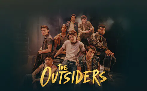 Cast of The Outsiders Broadway show in a group pose.