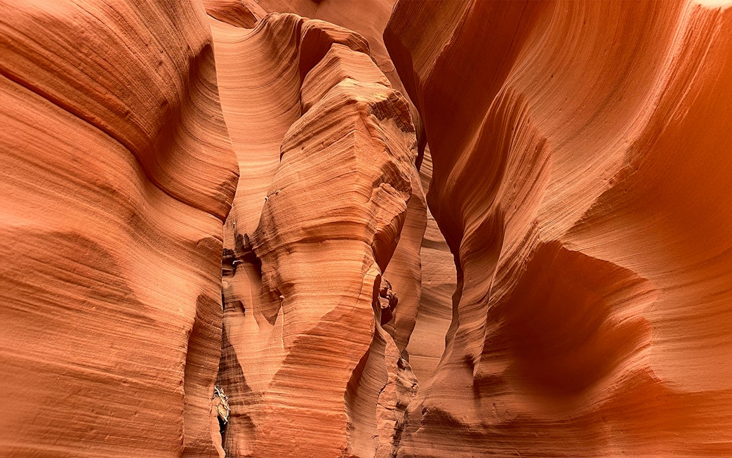 Antelope Canyon X sandstone formations with narrow passageways.