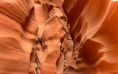 Antelope Canyon X sandstone formations with narrow passageways.