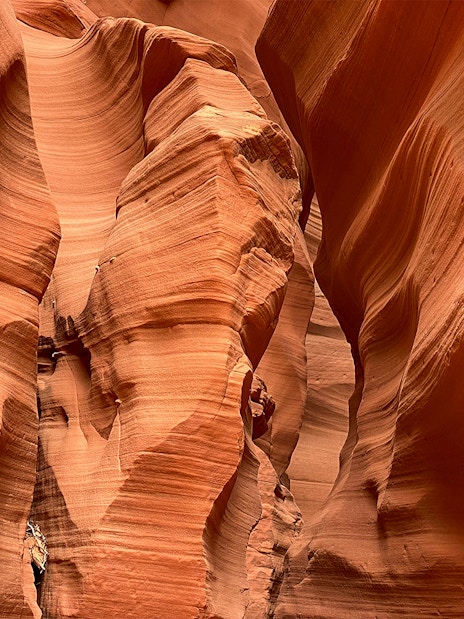 Antelope Canyon X sandstone formations with narrow passageways.