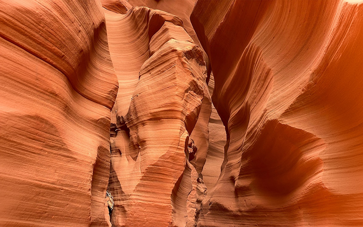 Antelope Canyon X sandstone formations with narrow passageways.
