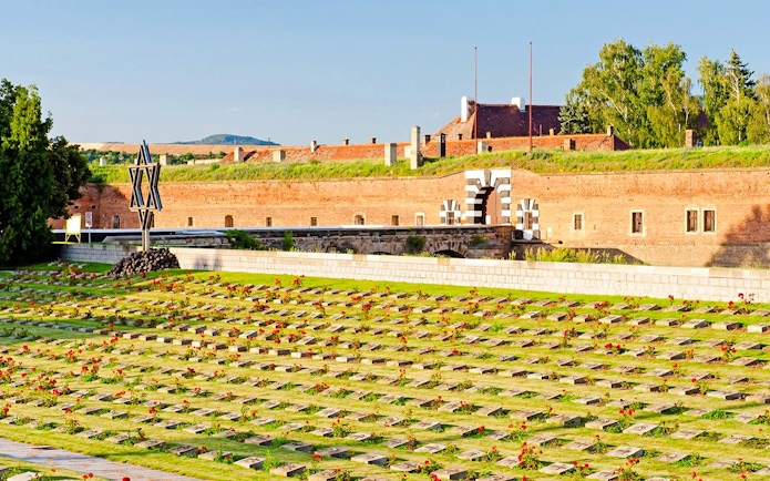 Terezin concentration camp cemetery with Star of David memorial.
