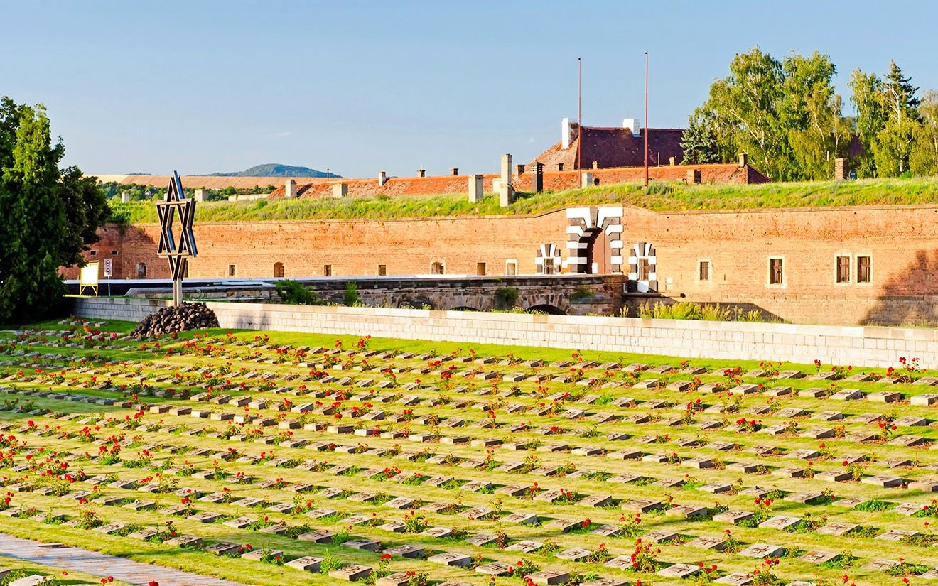 Terezin concentration camp cemetery with Star of David memorial.
