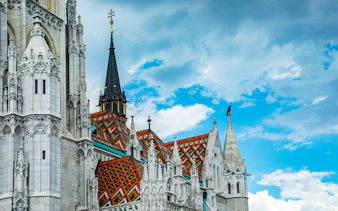 Fisherman's Bastion with ornate spires and colorful roof in Budapest.