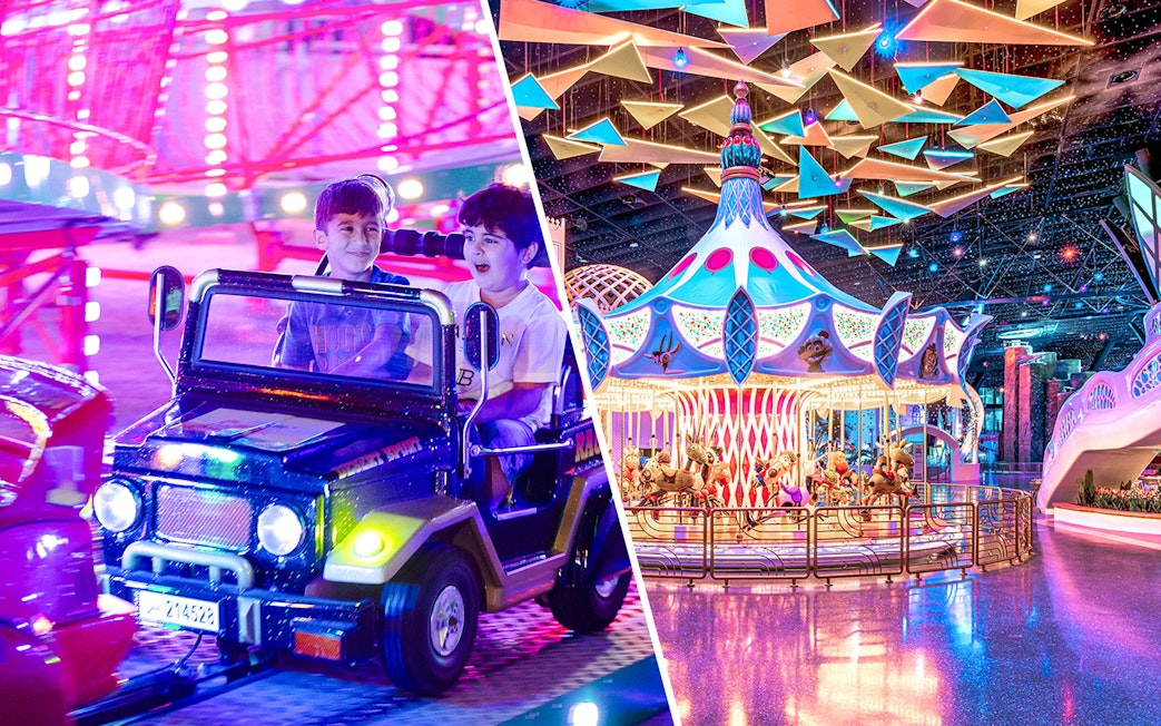 Children enjoying rides at Doha Quest Theme Park, featuring a carousel and mini jeep ride.