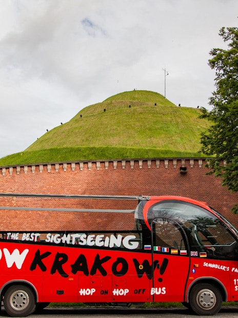 Red Kraków hop-on hop-off bus near Kościuszko Mound, Kraków.