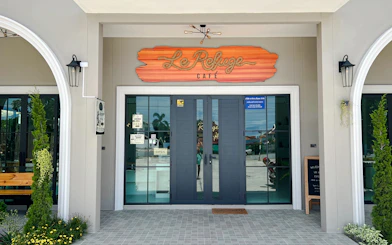 Entrance of Le Refuge Café at the animal sanctuary in Pattaya.