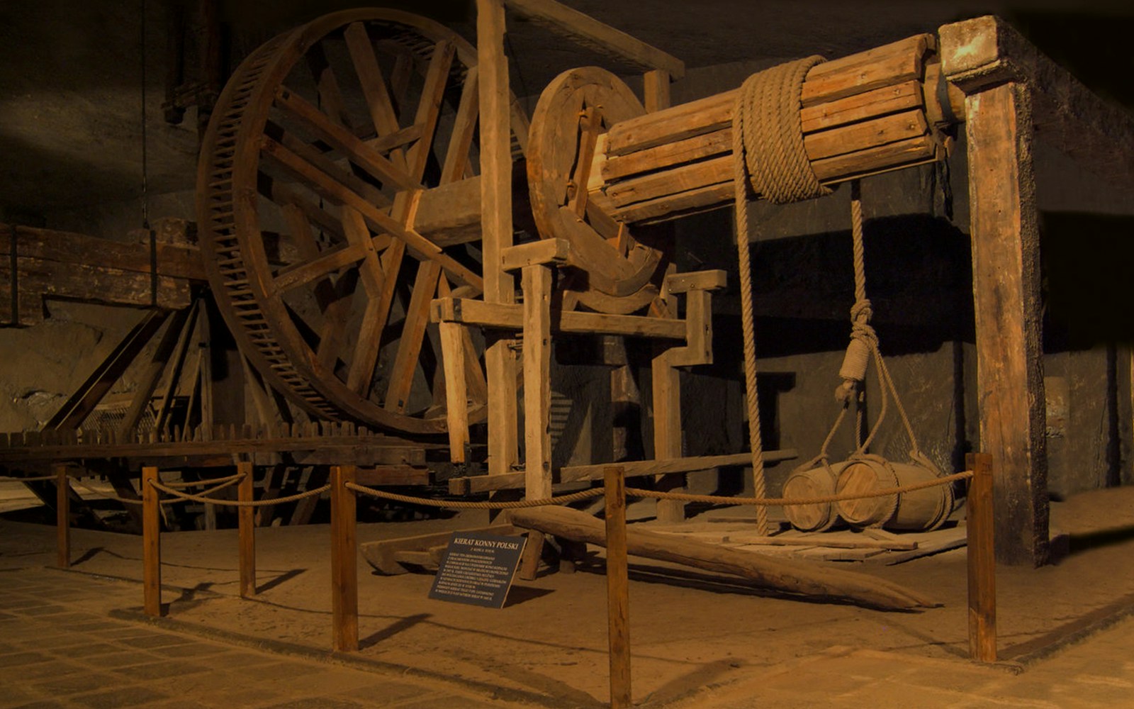 Wieliczka Salt Mine wooden pulley system in underground chamber.