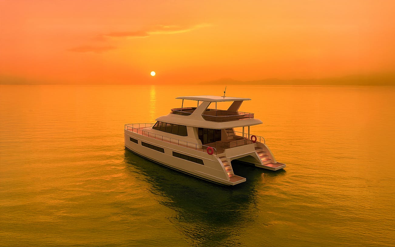 Langkawi sunset cruise with sailboat on calm sea, silhouetted against vibrant sunset sky.