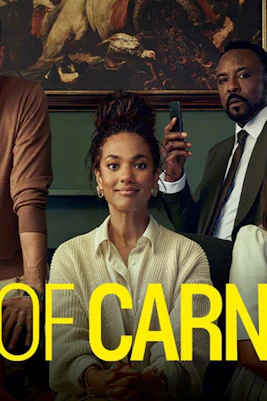 Cast of "God of Carnage" in a library setting with bookshelves and artwork.