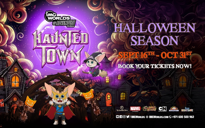 Haunted Town event at IMG Worlds of Adventure, Dubai, featuring Halloween-themed characters and decorations.