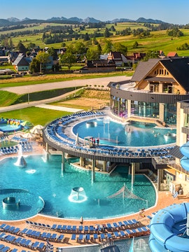 Zakopane Thermal Baths with outdoor pools and mountain views in Poland.