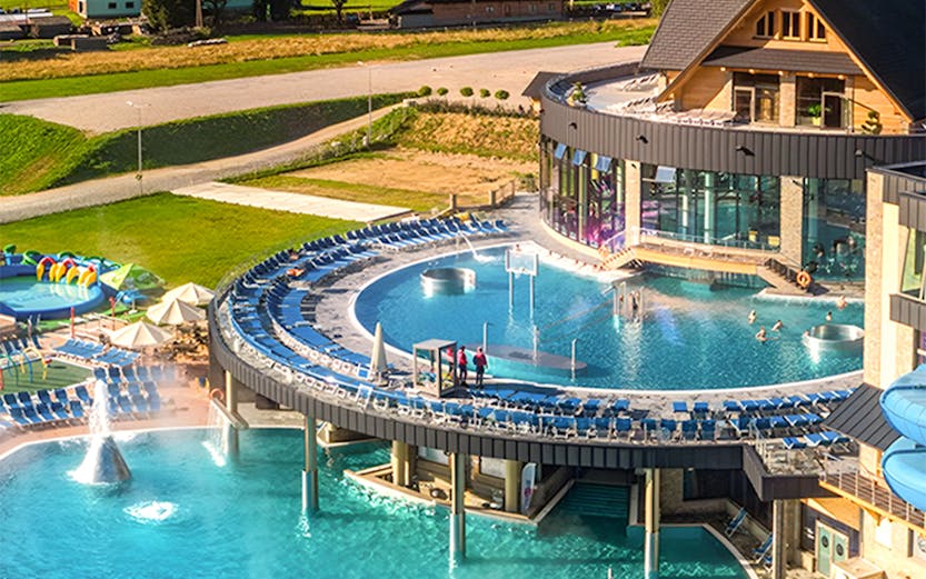 Zakopane Thermal Baths with outdoor pools and mountain views in Poland.