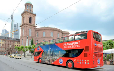 Frankfurt sightseeing bus near St. Paul's Church on Skyline Hop-On Hop-Off tour.