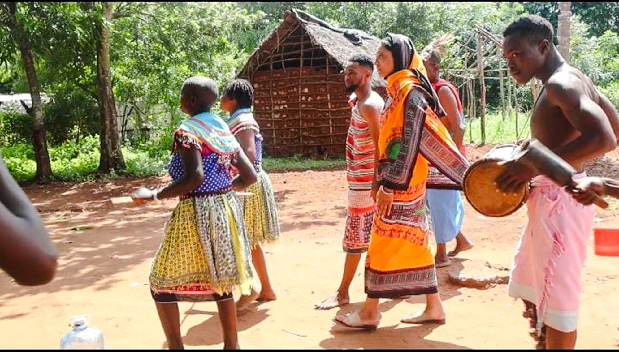 Duruma villagers performing traditional dance at Diani Beach demo village tour.