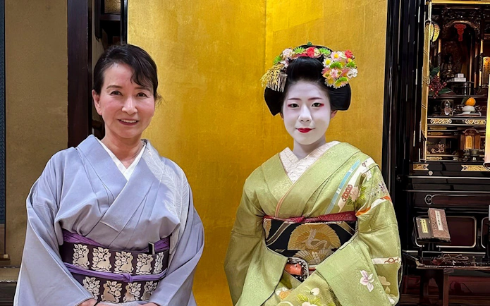 Two women in traditional kimonos, including a Maiko, in Kyoto.