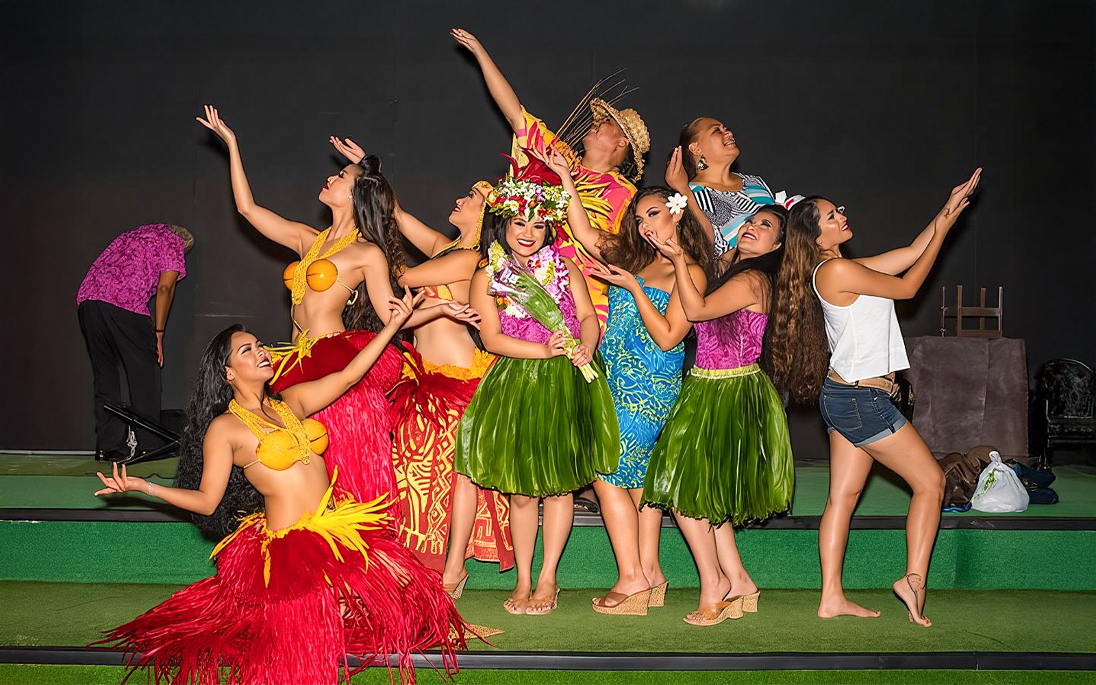 Performers in traditional attire at Paradise Cove Luau, Hawaii.